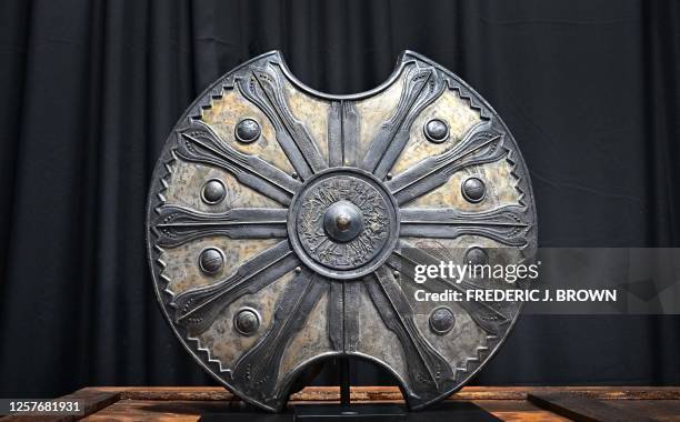 Bradd Pitt's Achilles shield from the 2004 film "Troy" is displayed at Propstore in Valencia, California on May 16, 2023. The Propstore's live...