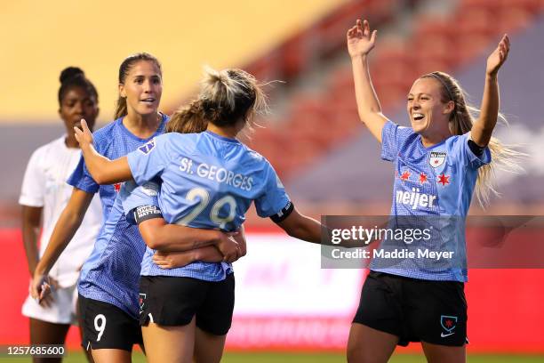 Bianca St. Georges of Chicago Red Stars celebrates with her teammates Rachel Hill, Savannah McCaskill and Katie Johnson after scoring a goal in the...