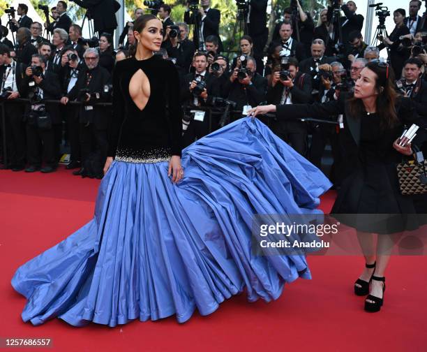Model Olivia Culpo arrives for the premiere of the film Asteroid City during the 76th Cannes Film Festival at Palais des Festivals in Cannes, France...