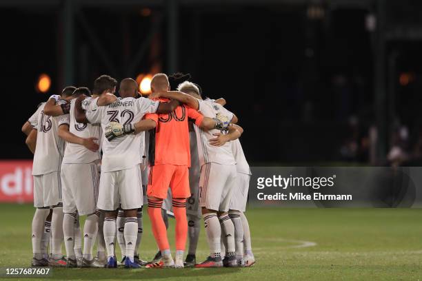 Players of Colorado Rapids huddle before a match against Minnesota United FC as part of MLS Is Back Tournament at ESPN Wide World of Sports Complex...