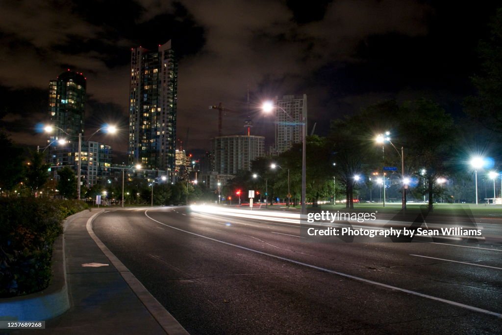 Downtown car and city lights at night
