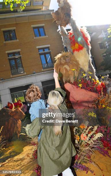 Year old Otto Pelham and his mum attend the launch of Chelsea in Bloom with the theme 'Flowers On Film' in line with the launch of the RHS Chelsea...