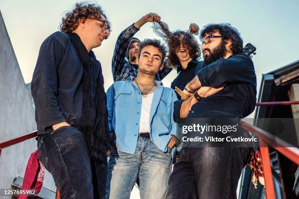 rock band portrait - rock musician stock pictures, royalty-free photos & images