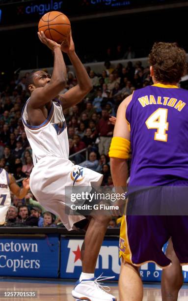 Gilbert Arenas of the Washington Wizards shoots the ball against the Los Angeles Lakers on December 26, 2005 at the MCI Center in Washington, DC....