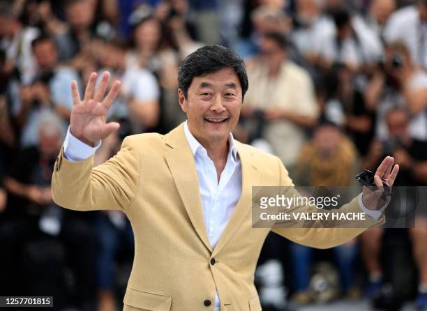 Actor Steve Park poses during a photocall for the film "Asteroid City" at the 76th edition of the Cannes Film Festival in Cannes, southern France, on...
