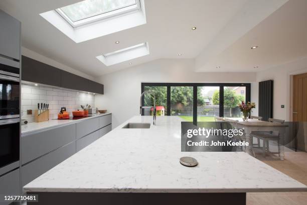 property interiors - quartz kitchen stock pictures, royalty-free photos & images