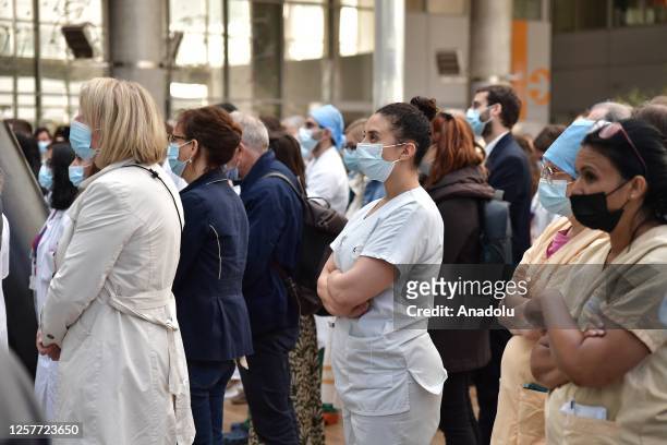 Doctors and nurses participate in the nationwide minute of silence at European Hospital Georges Pompidou on May 24, 2023 in Paris, France, to pay...