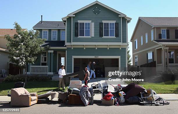 An eviction team removes furniture during a home foreclosure on September 21, 2011 in Longmont, Colorado. The family had already moved out of the...