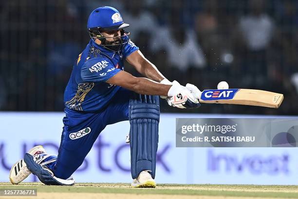 Mumbai Indians' Rohit Sharma plays a shot during the Indian Premier League Twenty20 eliminator cricket match between Lucknow Super Giants and Mumbai...