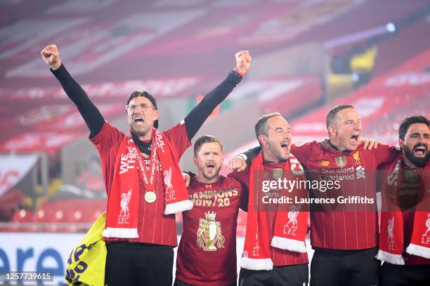 Jurgen Klopp, Manager of Liverpool leads the team in a rendition of "You'll Never Walk Alone" as they celebrate winning the League during the...