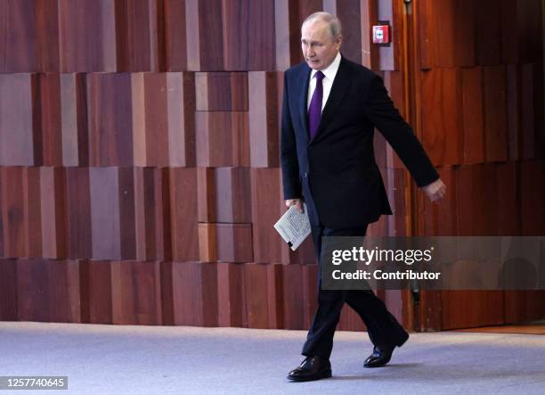 Russian President Vladimir Putin enters the hall during the 2nd Eurasian Economic Forum on May 24 in Moscow, Russia. Leaders of Russia, Belarus,...