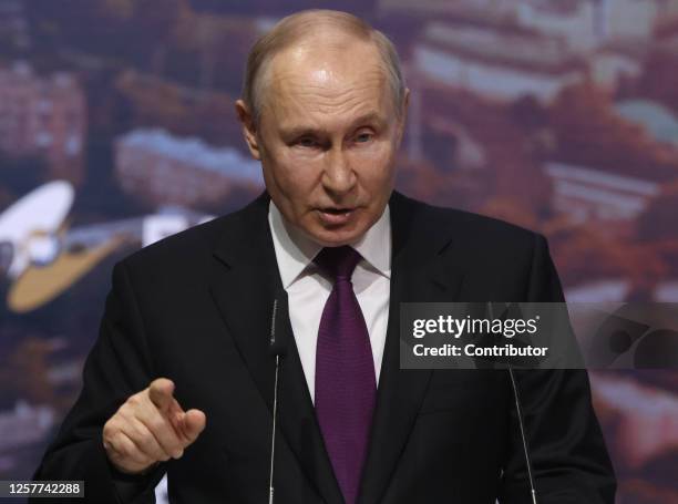 Russian President Vladimir Putin gestures during his speech at the 2nd Eurasian Economic Forum on May 24 in Moscow, Russia. Leaders of Russia,...