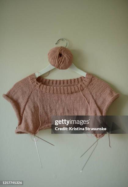 knitting sweater in pink color from top down, work in progress - incomplete stock pictures, royalty-free photos & images