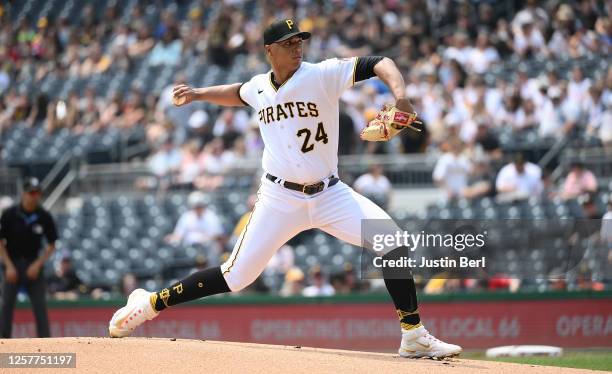 Johan Oviedo of the Pittsburgh Pirates delivers a pitch in the first inning during the game against the Texas Rangers at PNC Park on May 24, 2023 in...