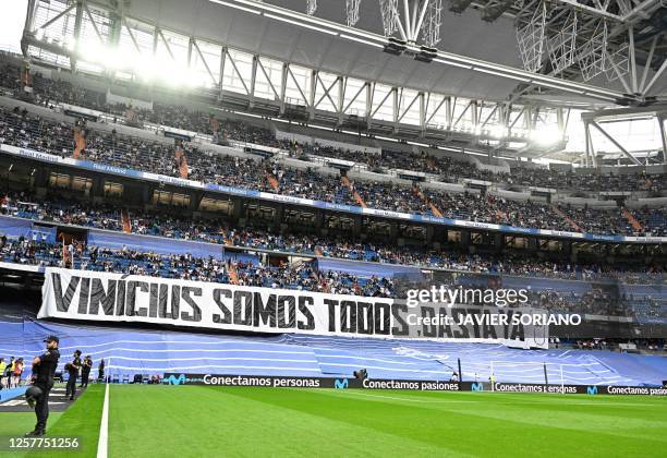 Picture taken prior the Spanish league football match between Real Madrid CF and Rayo Vallecano de Madrid shows a banner reading 'We all are...