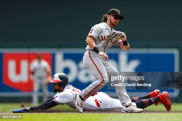 Byron Buxton of the Minnesota Twins steals second base against Brett Wisely of the San Francisco Giants in the first inning at Target Field on May...