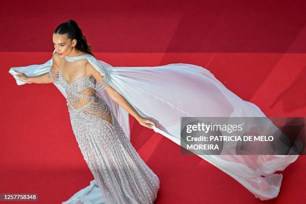 British model Hana Cross arrives for the screening of the film "La Passion de Dodin Bouffant" during the 76th edition of the Cannes Film Festival in...