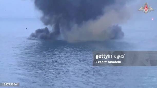 Screen grab captured from a video shows Russian warship belonging to its Black Sea fleet allegedly destroying unmanned surface vessels of Ukraine in...
