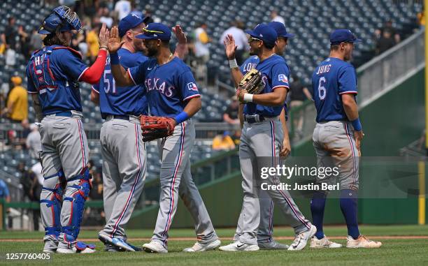 The Texas Rangers celebrate following a 3-2 win over the Pittsburgh Pirates during the game at PNC Park on May 24, 2023 in Pittsburgh, Pennsylvania.