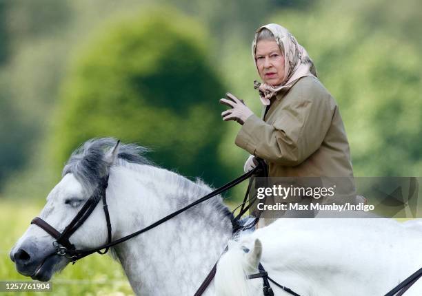 Queen Elizabeth II seen horse riding in the grounds of Windsor Castle on June 2, 2006 in Windsor, England.