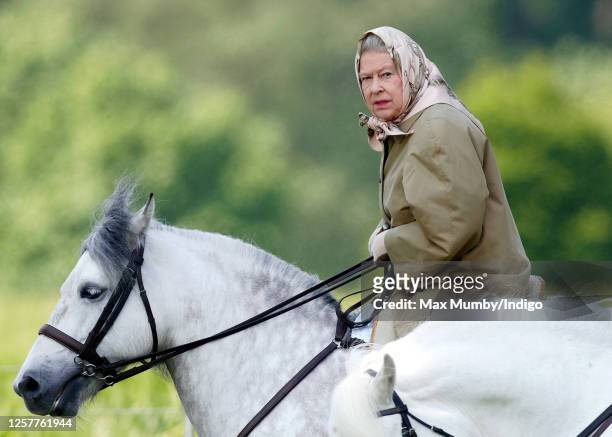 Queen Elizabeth II seen horse riding in the grounds of Windsor Castle on June 2, 2006 in Windsor, England.