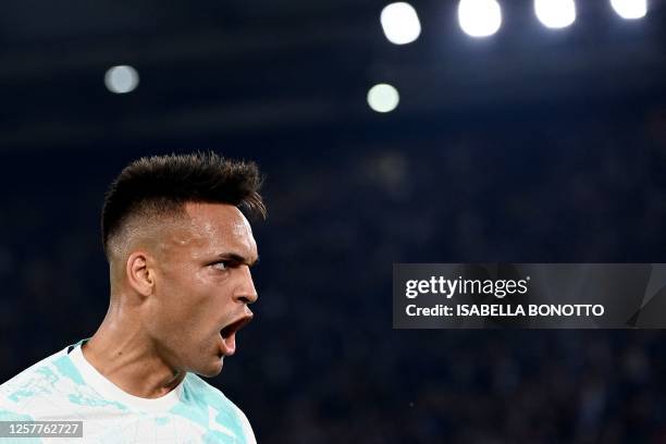 Inter Milan's Argentinian forward Lautaro Martinez celebrates scoring his team's first goal during the Italian Cup final football match between...