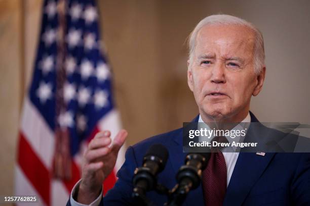 President Joe Biden delivers remarks on the one-year anniversary of the mass shooting in Uvalde, Texas at the Grand Staircase of the White House on...