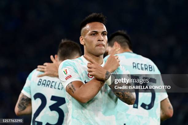 Inter Milan's Argentinian forward Lautaro Martinez celebrates scoring his team's second goal during the Italian Cup final football match between...