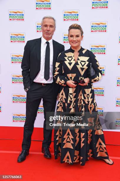 Hannes Jaenicke and Jenny Jürgens attend the Postcode Lotterie Charity Gala at The Frame on May 24, 2023 in Dusseldorf, Germany.