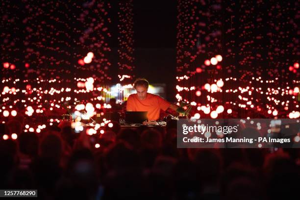 Four Tet perform in surround sound with lighting by art collective Squidsoup, at Alexandra Palace in London. Picture date: Wednesday May 24, 2023.