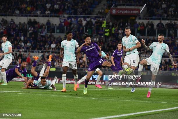 Fiorentina's Argentinian forward Nicolas Gonzalez shoots the ball during the Italian Cup final football match between Fiorentina and Inter Milan at...