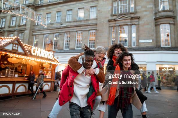 fun and laughs at the xmas market - outdoor concession stand stock pictures, royalty-free photos & images