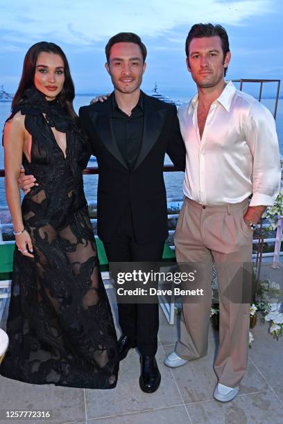 Amy Jackson, Ed Westwick and Alex Pettyfer attend the launch of the new Aston Martin DB12 at the Hotel du Cap-Eden-Roc in Antibes on May 24, 2023 in...