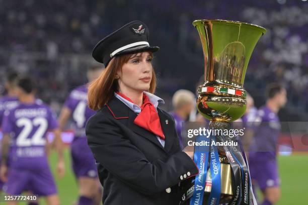 Trophy is being brought before the Italian Cup final soccer match between ACF Fiorentina and Inter Milan FC at Stadio Olimpico on May 24,2023 in...