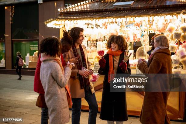 thanks for the lollipop - christmas market uk stock pictures, royalty-free photos & images