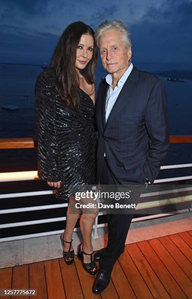 Catherine Zeta-Jones and Michael Douglas attend the launch of the new Aston Martin DB12 at the Hotel du Cap-Eden-Roc in Antibes on May 24, 2023 in...