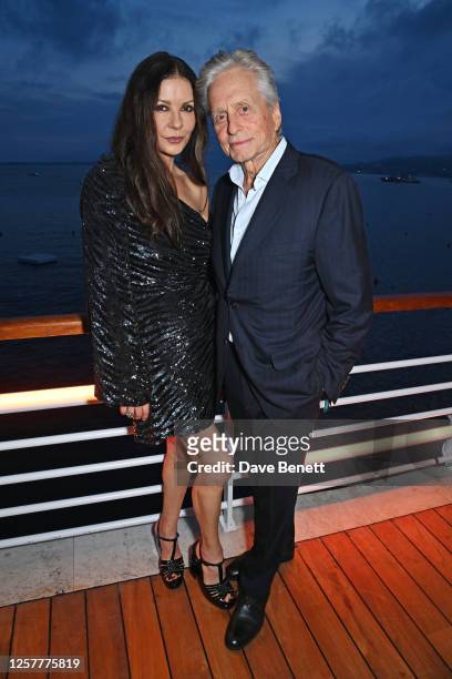 Catherine Zeta-Jones and Michael Douglas attend the launch of the new Aston Martin DB12 at the Hotel du Cap-Eden-Roc in Antibes on May 24, 2023 in...