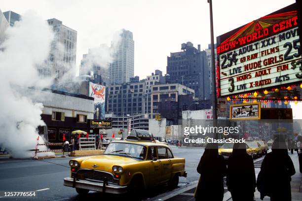 1970s View Of Backs Of Three Nuns Walking Past Marquee For A Porn Palace On 8Th Avenue And 42Nd Street New York City Ny USA