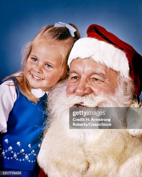 1960s Portrait Of Santa Claus And Little Blue-Eyed Blond Girl Both Smiling