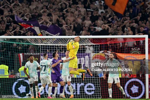 Inter Milan's Slovenian goalkeeper Samir Handanovic makes a save during the Italian Cup final football match between Fiorentina and Inter Milan at...