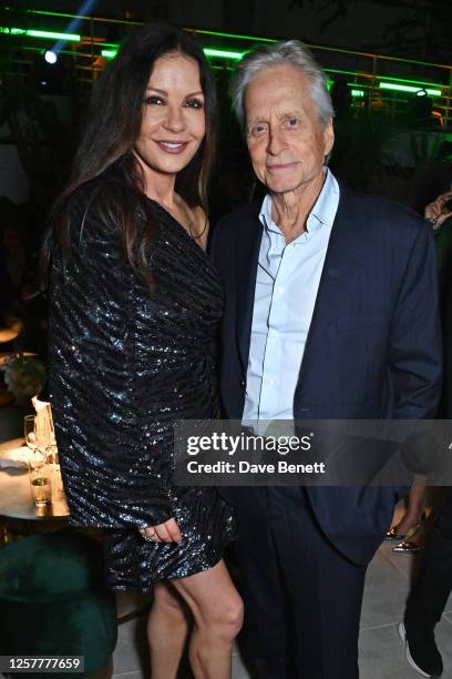 Catherine Zeta-Jones and Michael Douglas attend the launch of the new Aston Martin DB12 at the Hotel du Cap-Eden-Roc in Antibes on May 24, 2023 in...