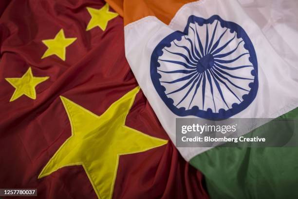 national flags of china and india - zuid china stockfoto's en -beelden
