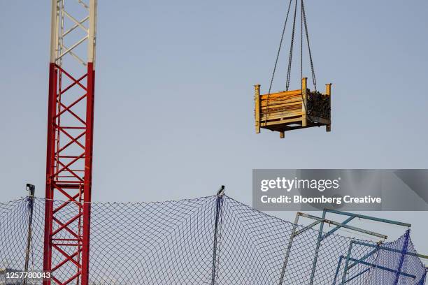 a construction crane - safety net stock pictures, royalty-free photos & images