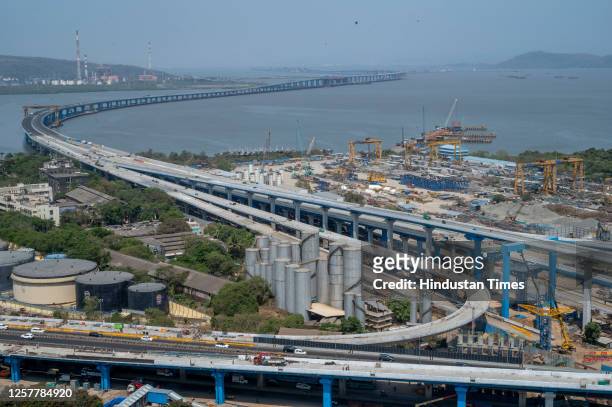 Chief Minister Eknath Shinde and DCM Devendra Fadnavis flag off a bus on a short distance on the newly completed Mumbai Trans Harbour Link on May 24,...