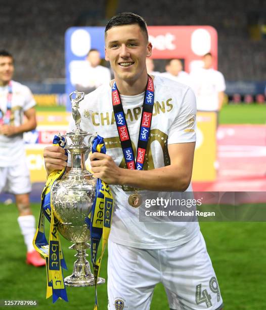 Oliver Casey of Leeds celebrates with the league trophy athe Sky Bet Championship match between Leeds United and Charlton Athletic at Elland Road on...