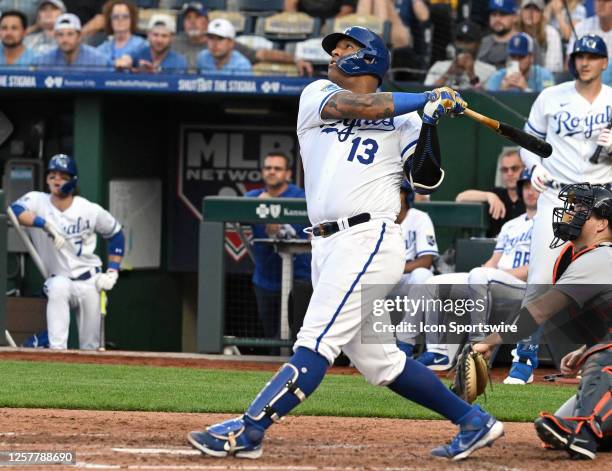 Kansas City Royals catcher Salvador Perez hits a sac fly in the fourth inning during an MLB game between the Detroit Tigers and the Kansas City...