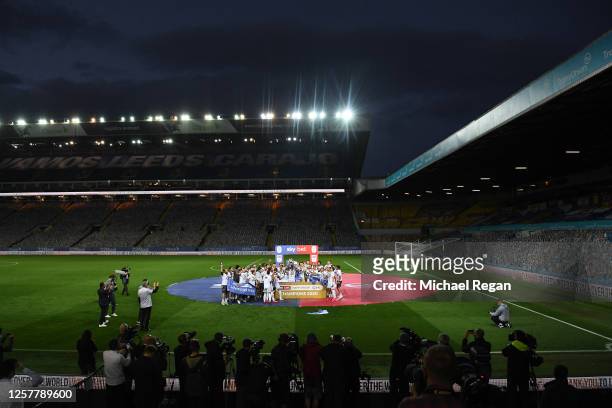 Leeds United celebrate with the league trophy after the Sky Bet Championship match between Leeds United and Charlton Athletic at Elland Road on July...