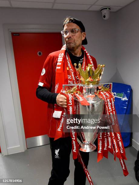 Jurgen Klopp manager of Liverpool with the Premier League trophy in the tunnel at the end of the Premier League match between Liverpool FC and...