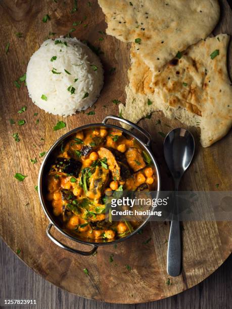 healthy vegan tika masala with basmati rice and naan bread - masala stock pictures, royalty-free photos & images
