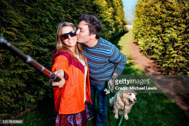 Late night host Jimmy Fallon is photographed with wife Nancy Juvonen and dog Gary for People Magazine on April 25, 2020 at home in New York.